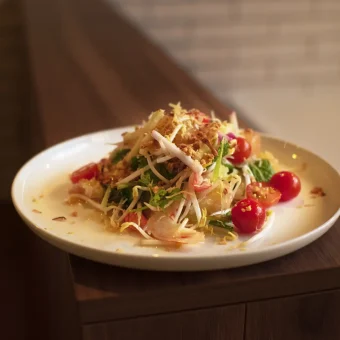 Asian noodles on a plate with delicious looking veggies